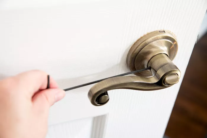 how-to-fix-a-loose-lever-door-handle-5222471-01-34a7f92a3d144c9d830f2a570216d23c.webp